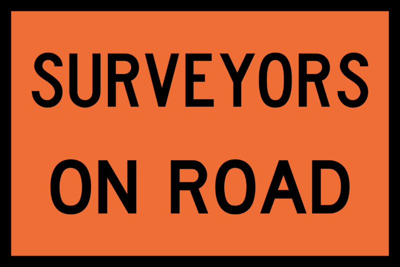 T2-239 Surveyors on Road Sign